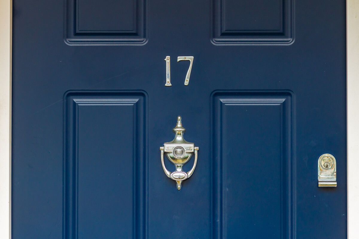 Door knocker blue door